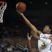 Michigan sophomore Trey Burke scores in the game against Saginaw Valley State on Monday. Daniel Brenner I AnnArbor.com